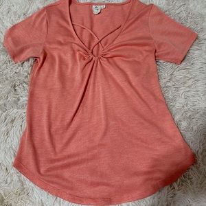 Beautiful designed peach colored shirt, size small. Soft made material and thin.